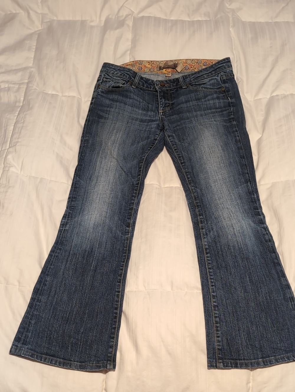PAIGE Dark Blue Flared Jeans with Faded Wash